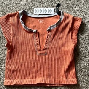 medium/large out from under tee from urban outfitters, new with tags.